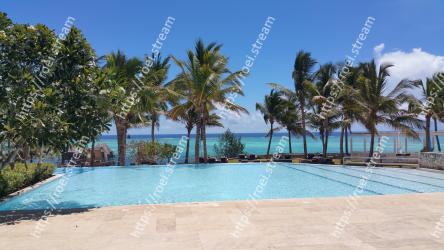 Swimming pool, Resort, Vacation, Property, Tree, Palm tree, Sky, Sea, Caribbean, Arecales 