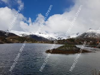 Highland, Sky, Mountain, Mountainous landforms, Snow, Cloud, Lake, Wilderness, Water, Mountain range 
