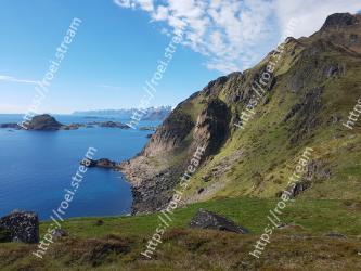 Body of water, Highland, Coast, Sky, Headland, Mountain, Sea, Mountainous landforms, Cliff, Coastal and oceanic landforms 