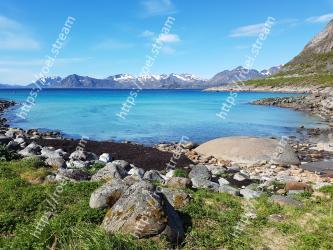 Body of water, Natural landscape, Mountain, Mountainous landforms, Coast, Sky, Wilderness, Water, Shore, Sea 