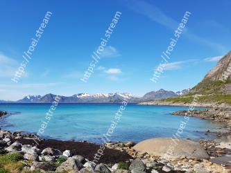 Body of water, Coast, Sky, Sea, Natural landscape, Blue, Mountain, Water, Shore, Coastal and oceanic landforms 