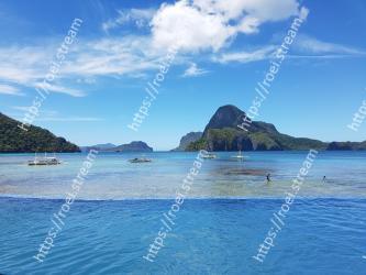 Body of water, Sky, Sea, Ocean, Blue, Coastal and oceanic landforms, Coast, Water, Tropics, Beach 
