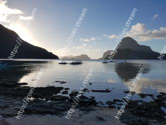 Body of water, Sky, Sea, Ocean, Water, Mountain, Cloud, Coast, Mountainous landforms, Beach 