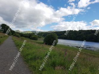 Natural landscape, Sky, Nature, Cloud, Highland, Natural environment, River, Grass, Reservoir, Tree 