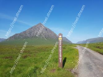 Mountainous landforms, Highland, Mountain, Hill, Mountain range, Grassland, Fell, Road, Ecoregion, Sky 
