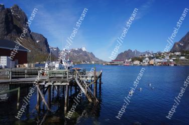 Body of water, Sky, Water, Mountain, Town, Harbor, Fjord, Reflection, Mountain range, Lake 