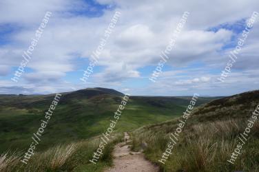 Highland, Mountainous landforms, Hill, Grassland, Sky, Mountain, Fell, Natural landscape, Wilderness, Grass 