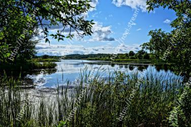 Natural landscape, Body of water, Nature, Water, Reflection, Nature reserve, Sky, Vegetation, Tree, Natural environment 