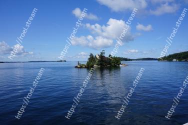 Body of water, Sky, Blue, Water, Sea, Water resources, Ocean, Island, Natural landscape, Coastal and oceanic landforms 