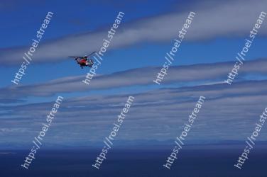 Helicopter, Rotorcraft, Sky, Aircraft, Vehicle, Helicopter rotor, Cloud, Ocean, Flight, Aviation 