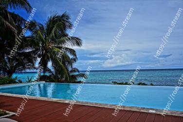 Swimming pool, Resort, Property, Vacation, Tropics, Caribbean, Sky, Ocean, Sea, Tree 