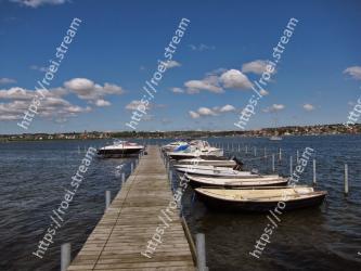 Water transportation, Sky, Water, Dock, Pier, Boat, Daytime, Sea, Cloud, Vehicle 